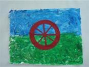 Collage de la bandera gitana realizado por los alumnos de primaria <br>del CEIP “Felipe II”<br>
